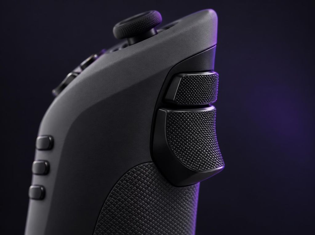 Close-up of the bumper and analogue trigger on the upper rear edge of a Dual Strike shell.